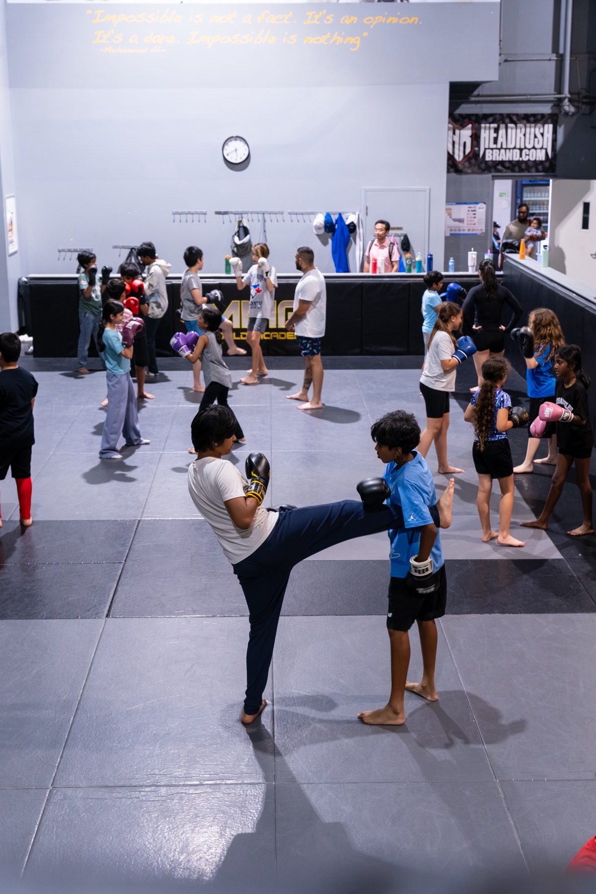 A busy class training inside MMA World Academy